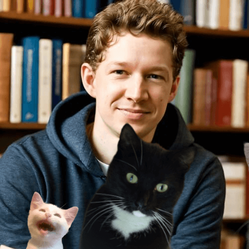 Katzensitter Oldenburg Katzensitter in Oldenburg mit einem schwarz-weißen Kater und einer weißen Katze.